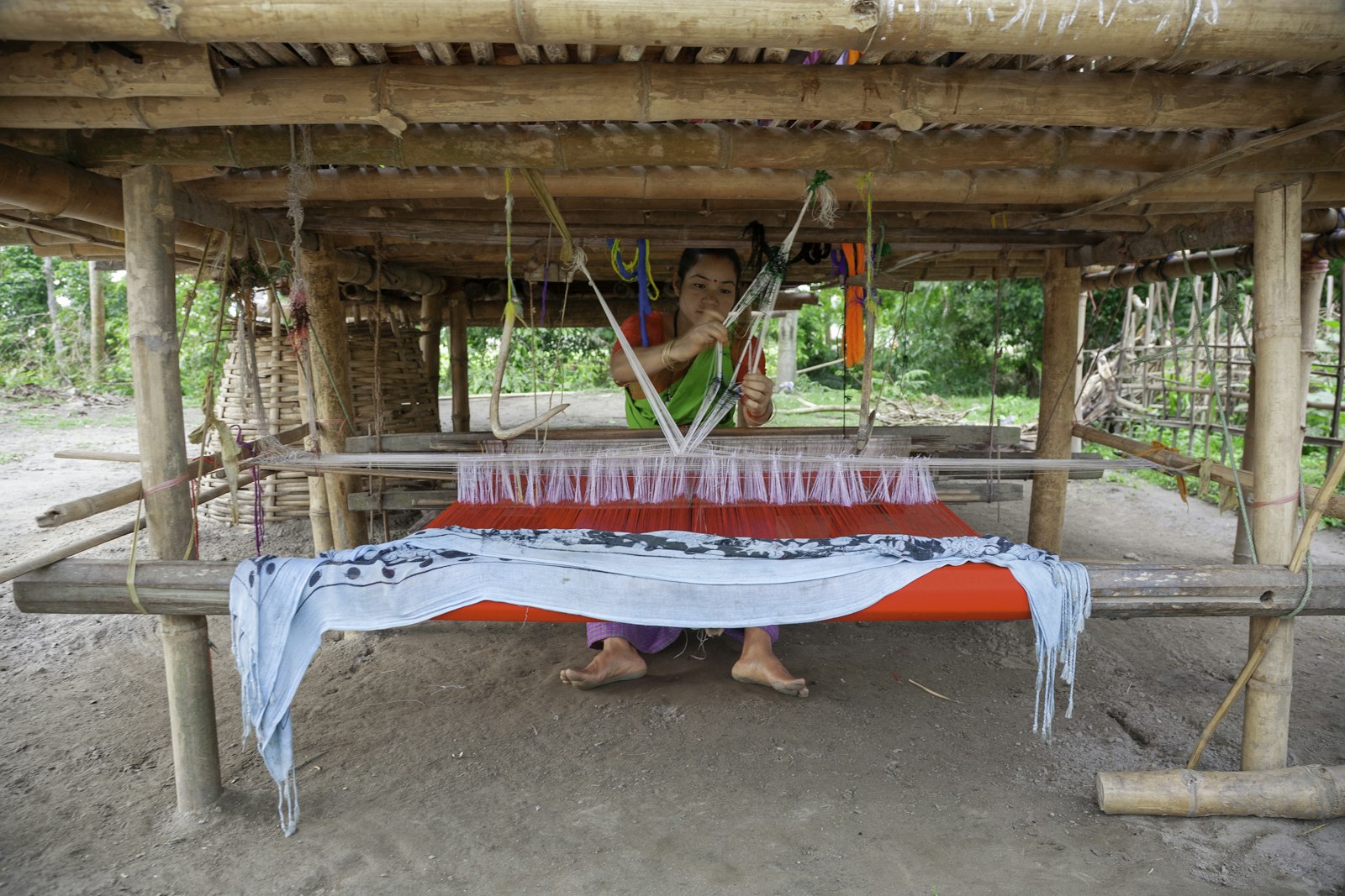 Traditional Indian handloom weaver at work in Majuli, Assam